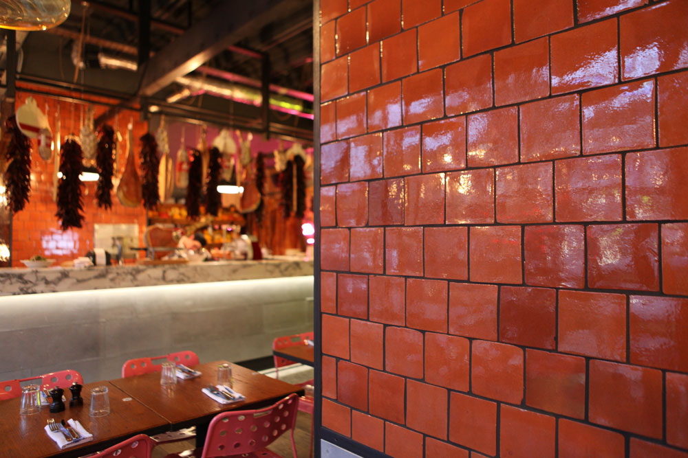 terracotta ceramic tiles with black grout